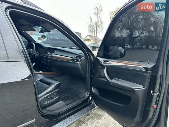 Черный БМВ Х5, объемом двигателя 3 л и пробегом 270 тыс. км за 12250 $, фото 89 на Automoto.ua
