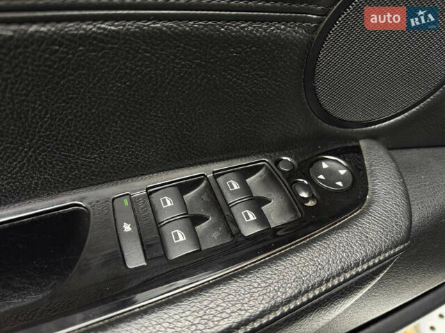 Черный БМВ Х5, объемом двигателя 4.8 л и пробегом 234 тыс. км за 11900 $, фото 23 на Automoto.ua