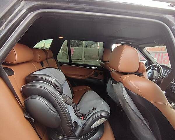 Черный БМВ Х5, объемом двигателя 3 л и пробегом 312 тыс. км за 12500 $, фото 6 на Automoto.ua