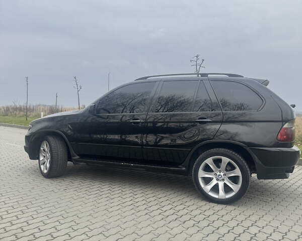 Чорний БМВ Х5, об'ємом двигуна 2.99 л та пробігом 297 тис. км за 12999 $, фото 15 на Automoto.ua