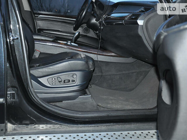 Чорний БМВ Х5, об'ємом двигуна 3 л та пробігом 141 тис. км за 25000 $, фото 4 на Automoto.ua