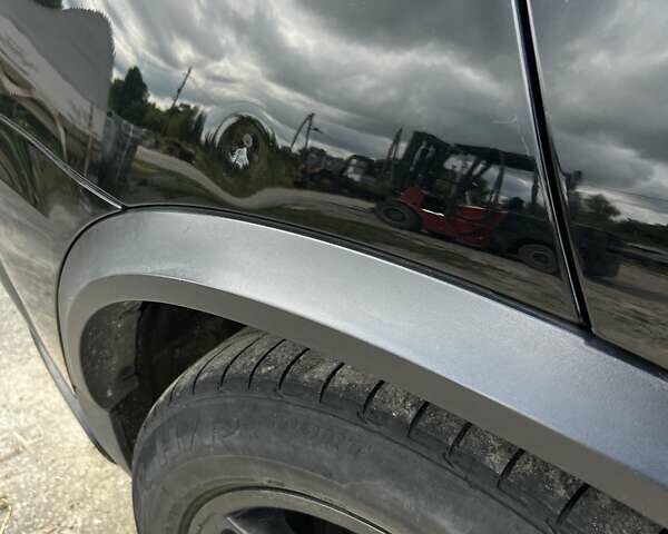 Черный БМВ Х5, объемом двигателя 4.8 л и пробегом 358 тыс. км за 10000 $, фото 1 на Automoto.ua