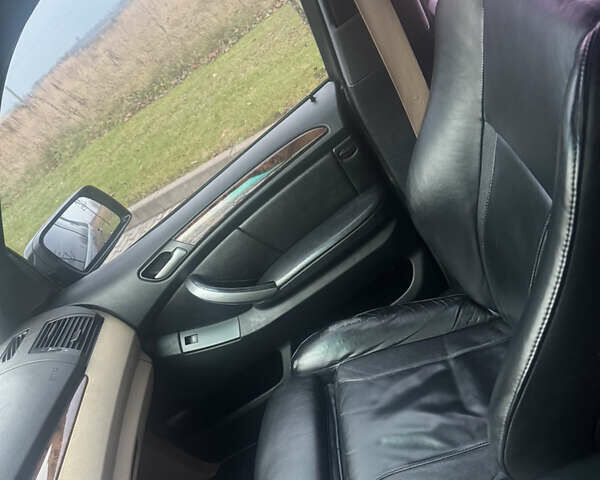 Чорний БМВ Х5, об'ємом двигуна 2.99 л та пробігом 297 тис. км за 12999 $, фото 58 на Automoto.ua