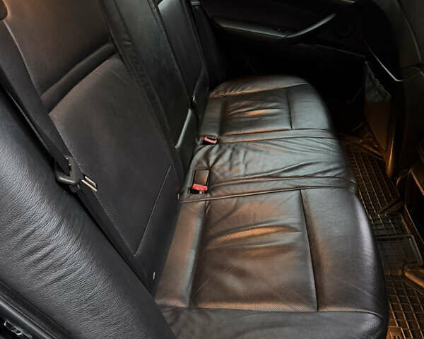 Черный БМВ Х5, объемом двигателя 3 л и пробегом 265 тыс. км за 12500 $, фото 27 на Automoto.ua