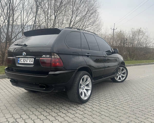 Чорний БМВ Х5, об'ємом двигуна 2.99 л та пробігом 297 тис. км за 12999 $, фото 22 на Automoto.ua