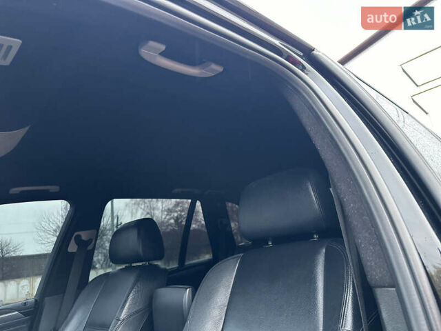 Черный БМВ Х5, объемом двигателя 3 л и пробегом 270 тыс. км за 12250 $, фото 64 на Automoto.ua