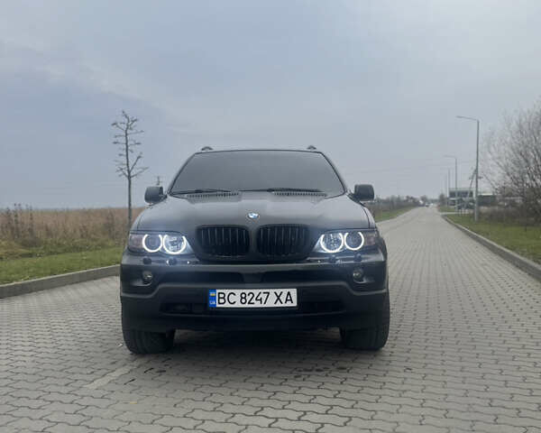 Чорний БМВ Х5, об'ємом двигуна 2.99 л та пробігом 297 тис. км за 12999 $, фото 79 на Automoto.ua