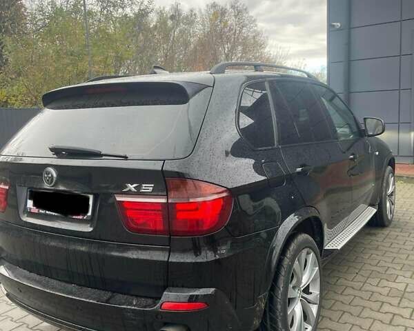 Черный БМВ Х5, объемом двигателя 3 л и пробегом 310 тыс. км за 12850 $, фото 4 на Automoto.ua