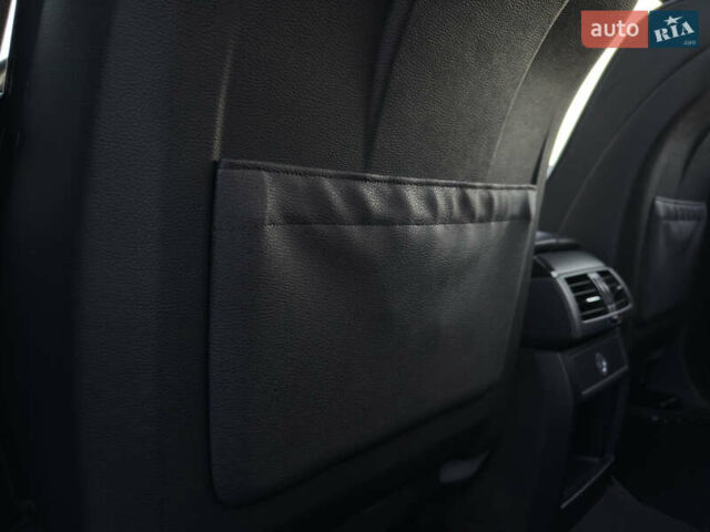 Чорний БМВ Х5, об'ємом двигуна 3 л та пробігом 110 тис. км за 12900 $, фото 70 на Automoto.ua
