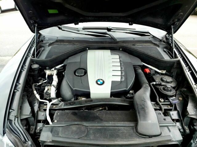 Черный БМВ Х5, объемом двигателя 3 л и пробегом 250 тыс. км за 16000 $, фото 23 на Automoto.ua