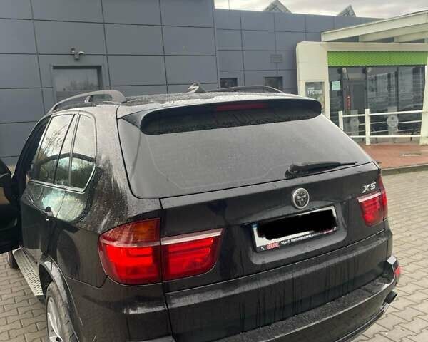 Черный БМВ Х5, объемом двигателя 3 л и пробегом 310 тыс. км за 12850 $, фото 1 на Automoto.ua