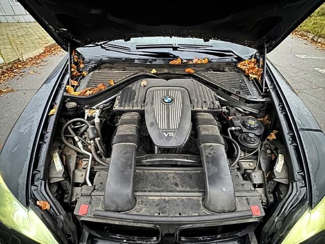 Черный БМВ Х5, объемом двигателя 4.8 л и пробегом 159 тыс. км за 10300 $, фото 7 на Automoto.ua