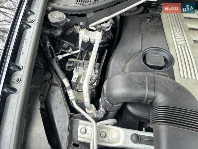 Черный БМВ Х5, объемом двигателя 3 л и пробегом 335 тыс. км за 14400 $, фото 29 на Automoto.ua