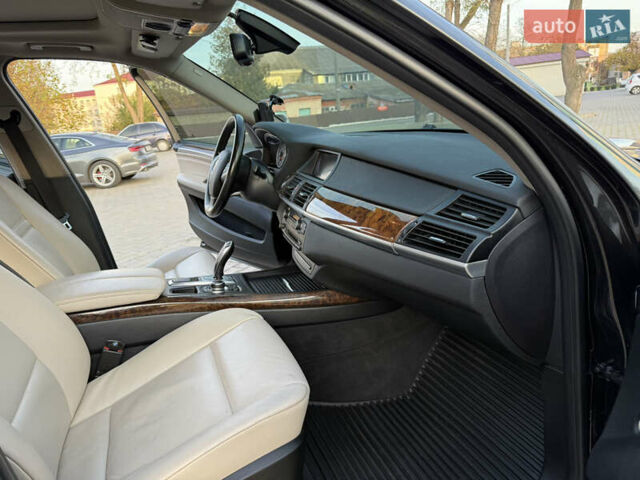 Черный БМВ Х5, объемом двигателя 3 л и пробегом 297 тыс. км за 16900 $, фото 16 на Automoto.ua