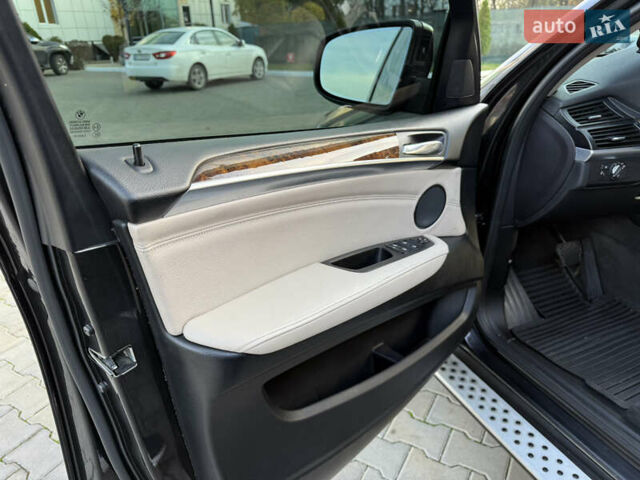 Черный БМВ Х5, объемом двигателя 3 л и пробегом 297 тыс. км за 16900 $, фото 22 на Automoto.ua