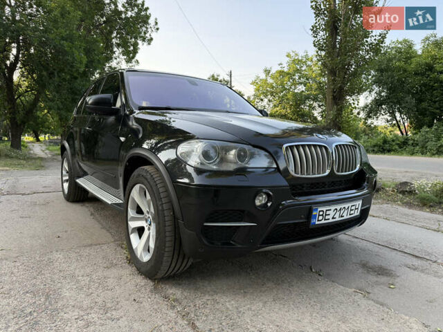 Черный БМВ Х5, объемом двигателя 2.99 л и пробегом 322 тыс. км за 18000 $, фото 1 на Automoto.ua