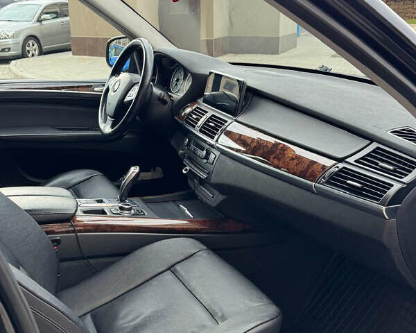 Чорний БМВ Х5, об'ємом двигуна 3 л та пробігом 170 тис. км за 14700 $, фото 11 на Automoto.ua