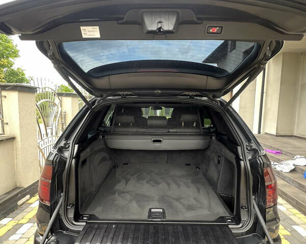 Черный БМВ Х5, объемом двигателя 3 л и пробегом 297 тыс. км за 19700 $, фото 25 на Automoto.ua