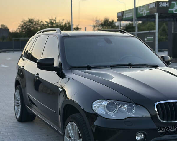 Чорний БМВ Х5, об'ємом двигуна 3 л та пробігом 303 тис. км за 21000 $, фото 1 на Automoto.ua