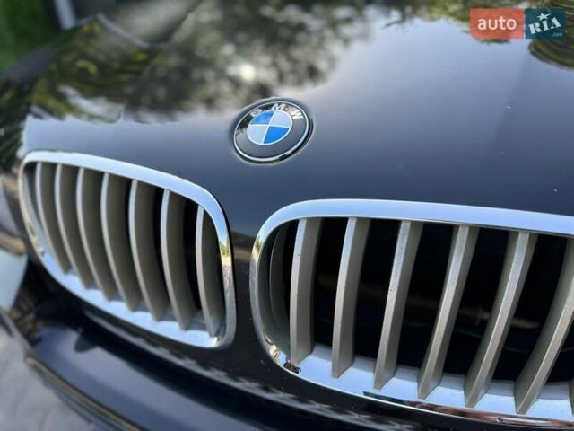 Черный БМВ Х5, объемом двигателя 3 л и пробегом 292 тыс. км за 17700 $, фото 30 на Automoto.ua