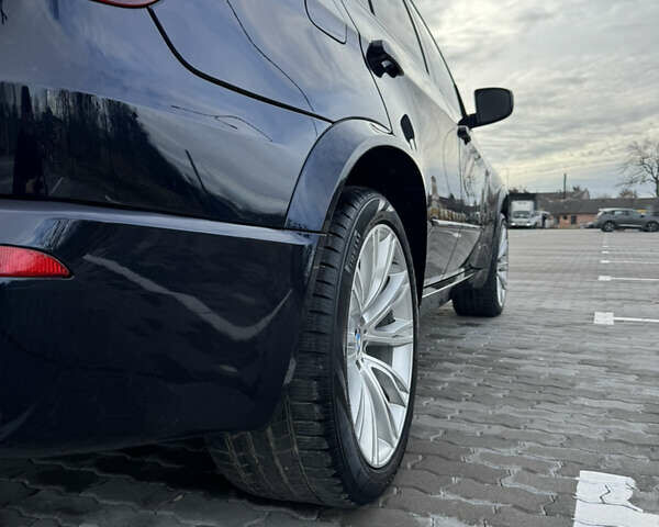 Черный БМВ Х5, объемом двигателя 3 л и пробегом 265 тыс. км за 21750 $, фото 4 на Automoto.ua