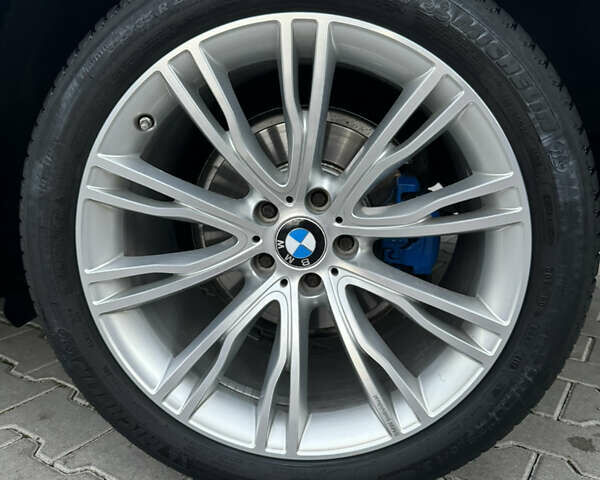 Черный БМВ Х5, объемом двигателя 3 л и пробегом 265 тыс. км за 22550 $, фото 34 на Automoto.ua