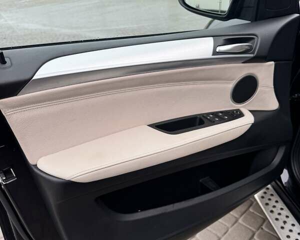 Черный БМВ Х5, объемом двигателя 3 л и пробегом 312 тыс. км за 21750 $, фото 4 на Automoto.ua