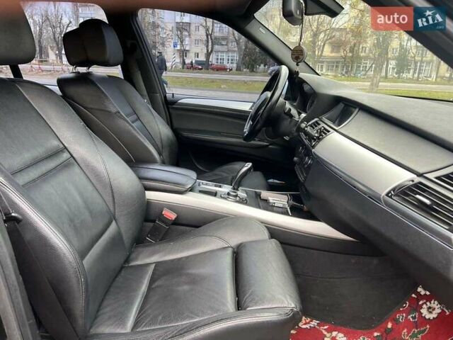 Черный БМВ Х5, объемом двигателя 3 л и пробегом 243 тыс. км за 15800 $, фото 25 на Automoto.ua