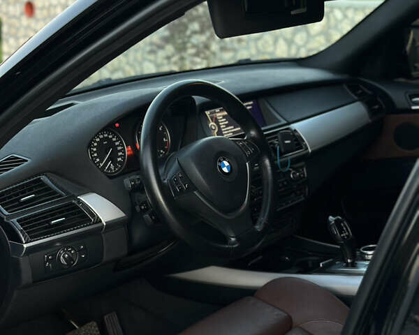 Чорний БМВ Х5, об'ємом двигуна 3 л та пробігом 303 тис. км за 21000 $, фото 3 на Automoto.ua
