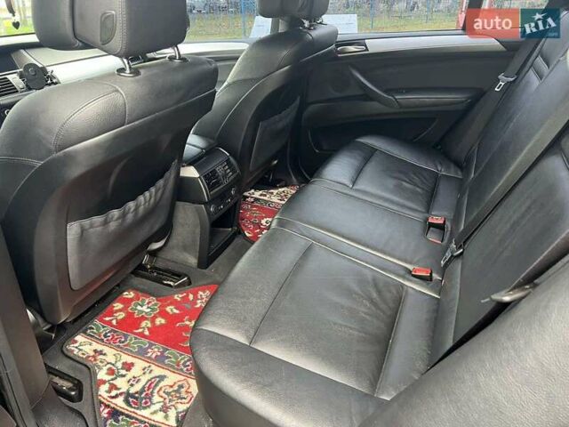 Черный БМВ Х5, объемом двигателя 3 л и пробегом 243 тыс. км за 15800 $, фото 21 на Automoto.ua