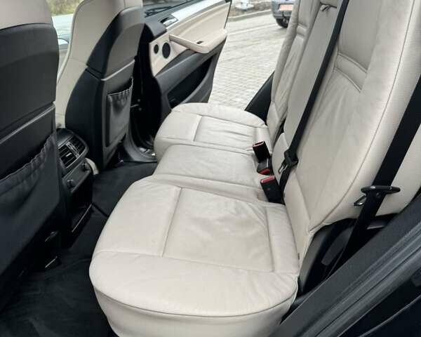Черный БМВ Х5, объемом двигателя 3 л и пробегом 312 тыс. км за 21750 $, фото 6 на Automoto.ua