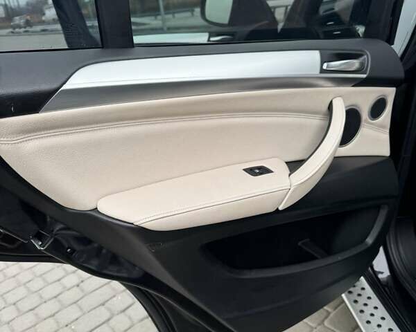 Черный БМВ Х5, объемом двигателя 3 л и пробегом 312 тыс. км за 21750 $, фото 7 на Automoto.ua