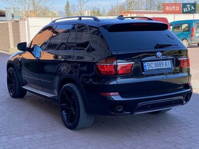Черный БМВ Х5, объемом двигателя 3 л и пробегом 322 тыс. км за 19900 $, фото 1 на Automoto.ua