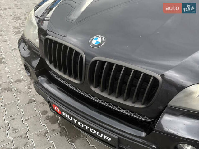 Черный БМВ Х5, объемом двигателя 3 л и пробегом 234 тыс. км за 16900 $, фото 1 на Automoto.ua