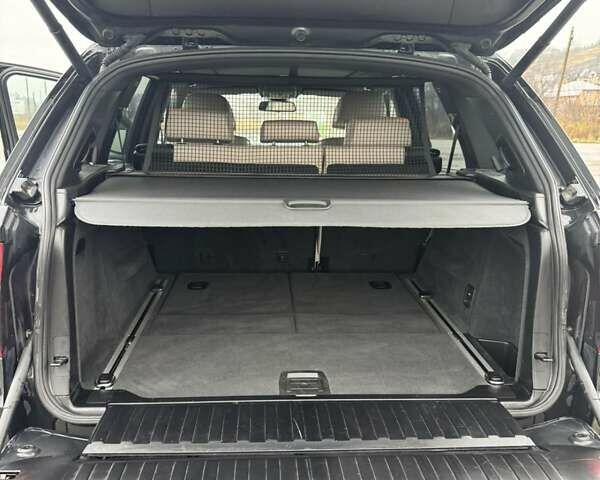 Черный БМВ Х5, объемом двигателя 3 л и пробегом 312 тыс. км за 21750 $, фото 1 на Automoto.ua