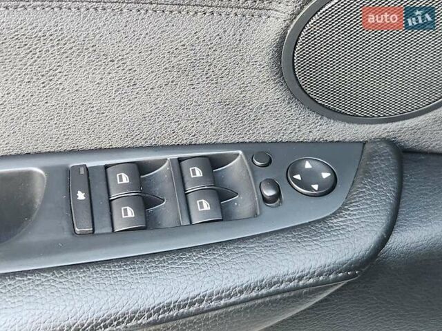 Чорний БМВ Х5, об'ємом двигуна 3 л та пробігом 218 тис. км за 17750 $, фото 79 на Automoto.ua