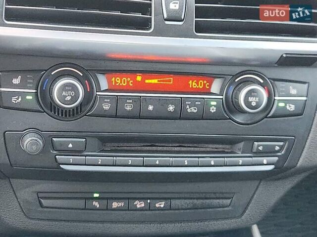 Чорний БМВ Х5, об'ємом двигуна 3 л та пробігом 218 тис. км за 17750 $, фото 76 на Automoto.ua