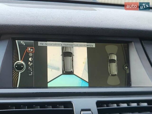 Чорний БМВ Х5, об'ємом двигуна 3 л та пробігом 218 тис. км за 17750 $, фото 78 на Automoto.ua