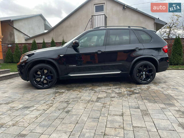 Чорний БМВ Х5, об'ємом двигуна 3 л та пробігом 180 тис. км за 22179 $, фото 1 на Automoto.ua