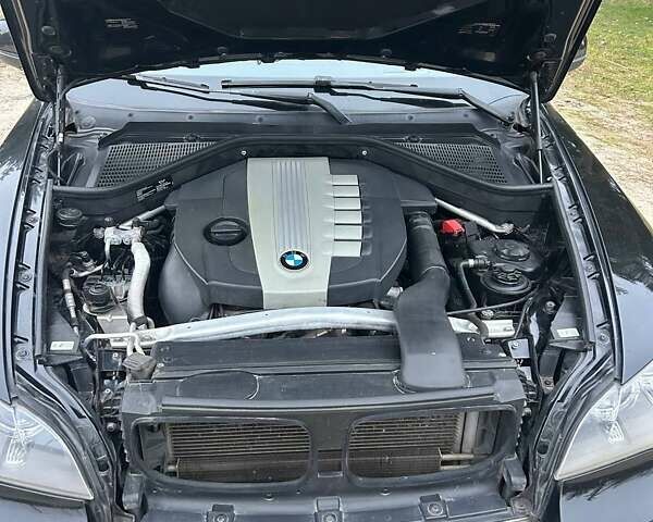 Черный БМВ Х5, объемом двигателя 3 л и пробегом 204 тыс. км за 21900 $, фото 21 на Automoto.ua