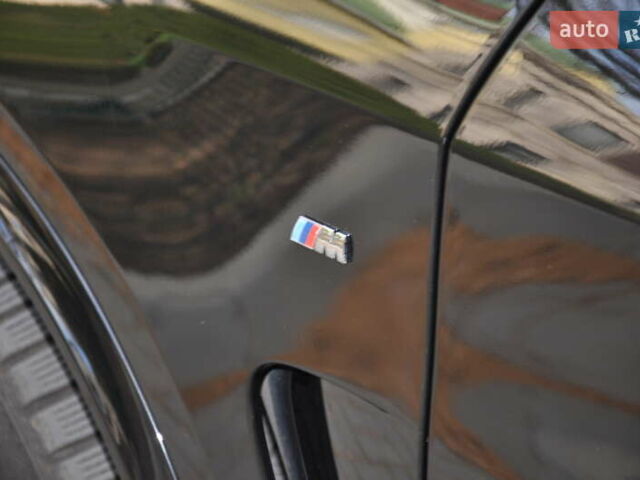 Чорний БМВ Х5, об'ємом двигуна 4.39 л та пробігом 129 тис. км за 26800 $, фото 13 на Automoto.ua