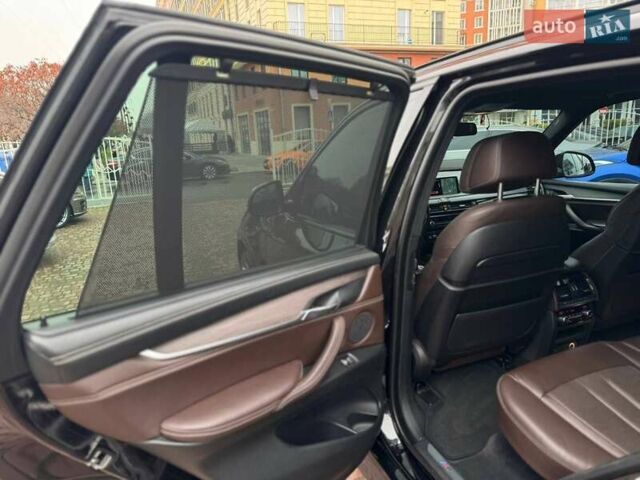 Чорний БМВ Х5, об'ємом двигуна 3 л та пробігом 126 тис. км за 31000 $, фото 28 на Automoto.ua