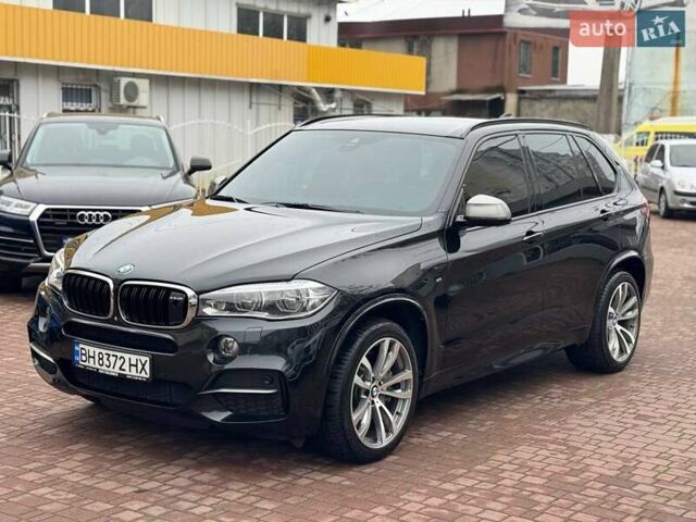 Чорний БМВ Х5, об'ємом двигуна 3 л та пробігом 126 тис. км за 31000 $, фото 4 на Automoto.ua