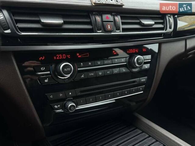 Чорний БМВ Х5, об'ємом двигуна 3 л та пробігом 126 тис. км за 31000 $, фото 27 на Automoto.ua