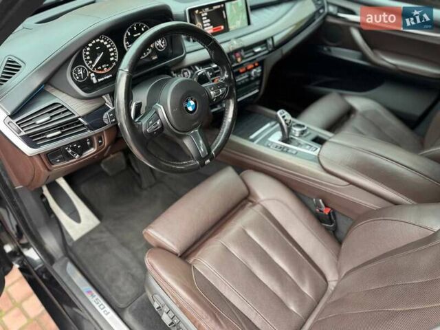 Чорний БМВ Х5, об'ємом двигуна 3 л та пробігом 126 тис. км за 31000 $, фото 18 на Automoto.ua