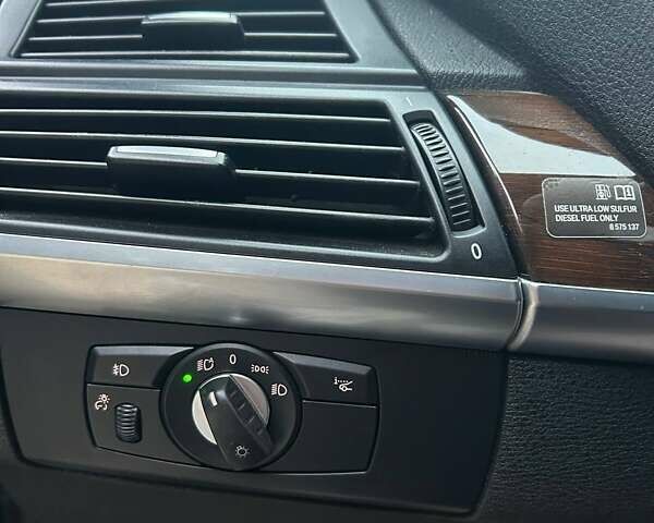 Черный БМВ Х5, объемом двигателя 3 л и пробегом 204 тыс. км за 21900 $, фото 22 на Automoto.ua