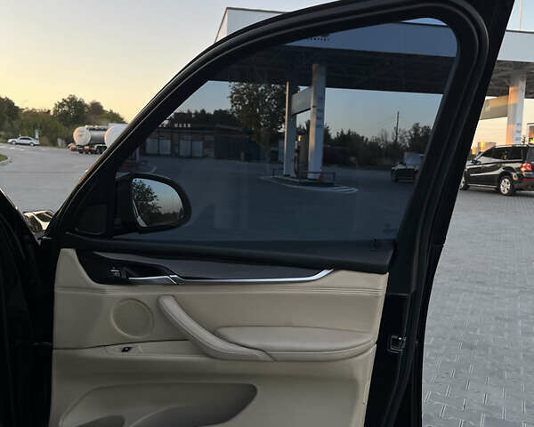 Чорний БМВ Х5, об'ємом двигуна 2.99 л та пробігом 210 тис. км за 24500 $, фото 17 на Automoto.ua