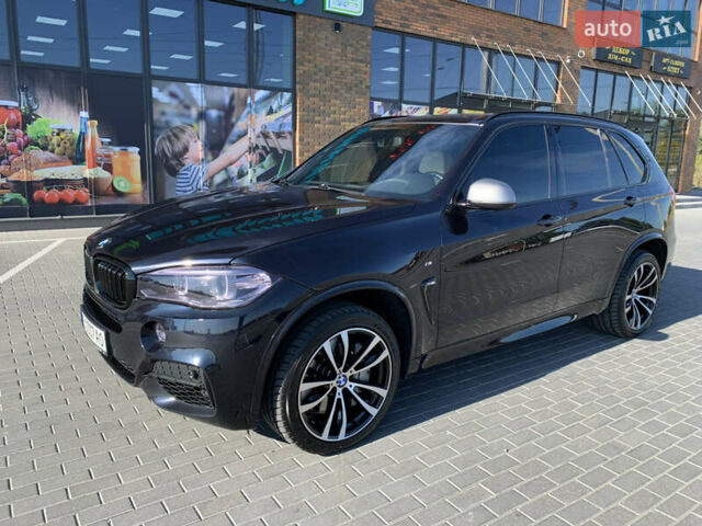 Черный БМВ Х5, объемом двигателя 3 л и пробегом 169 тыс. км за 30500 $, фото 1 на Automoto.ua
