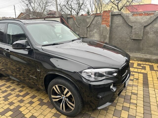 Черный БМВ Х5, объемом двигателя 3 л и пробегом 231 тыс. км за 26999 $, фото 1 на Automoto.ua