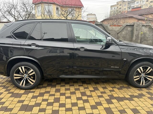 Черный БМВ Х5, объемом двигателя 3 л и пробегом 231 тыс. км за 26999 $, фото 6 на Automoto.ua